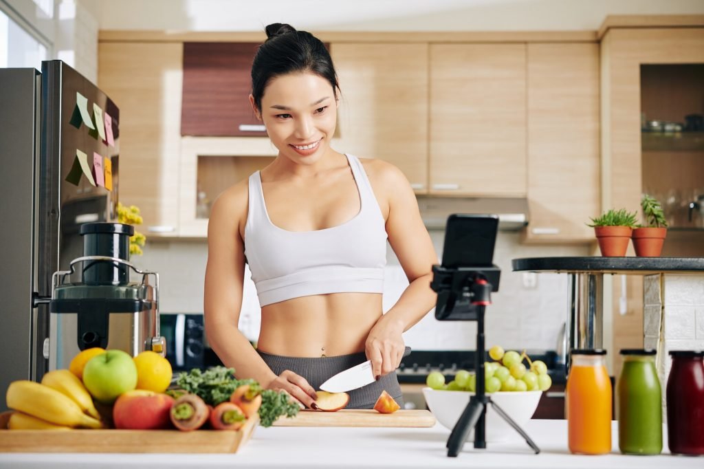 Woman recording cooking video